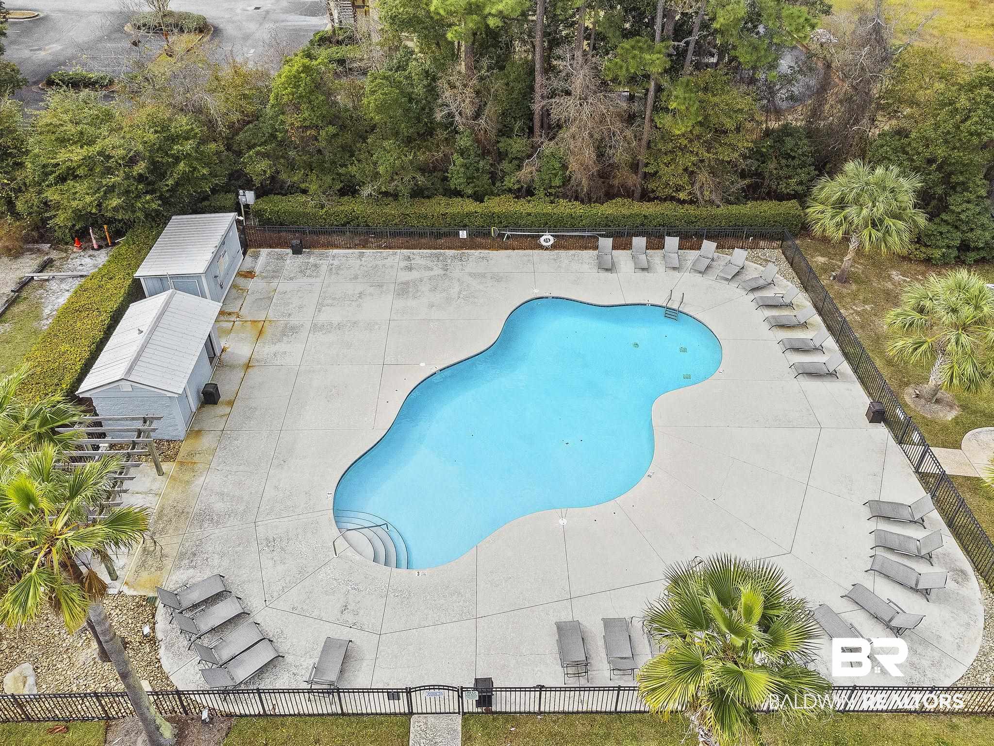 25861 Canal Road, Unit 78 Orange Beach, AL 36561 - Photo 39 of 45 Pool featuring fence private yard and a patio area