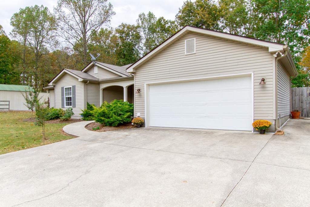 1727 Walden Ridge Road Manchester, TN 37355 - Photo 2 of 29 a view of house and outdoor space with yard