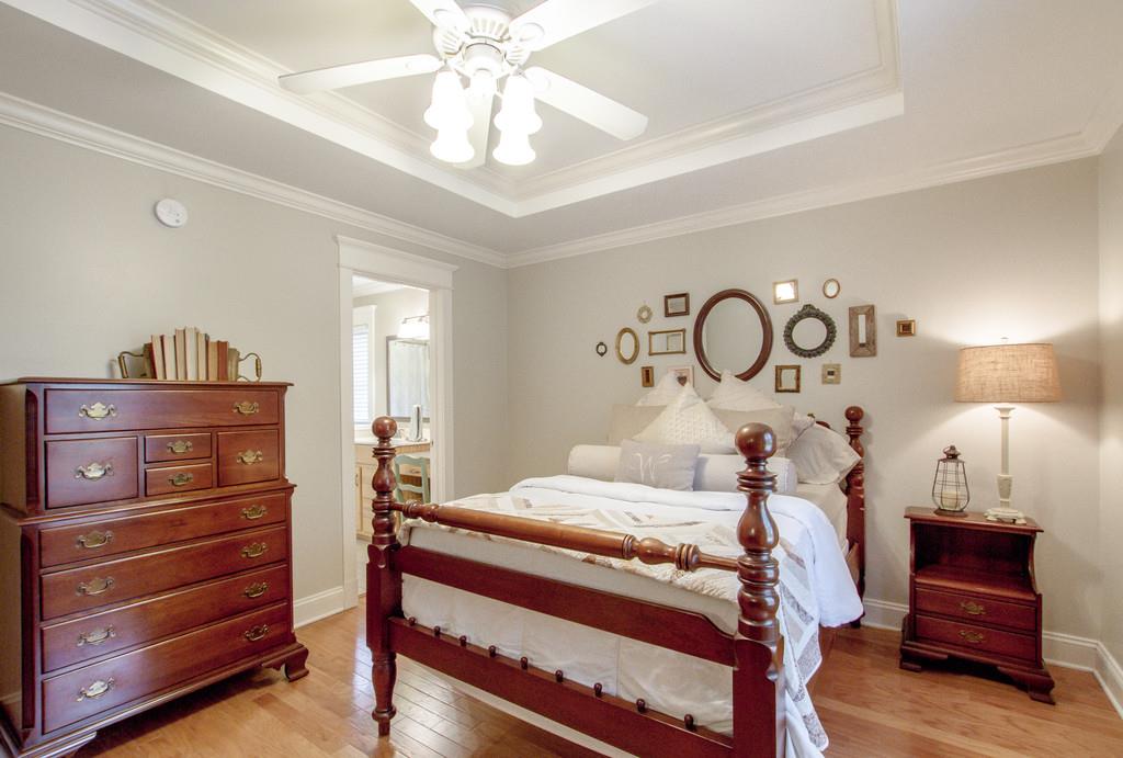 1727 Walden Ridge Road Manchester, TN 37355 - Photo 20 of 29 a bedroom with a bed and wooden floor