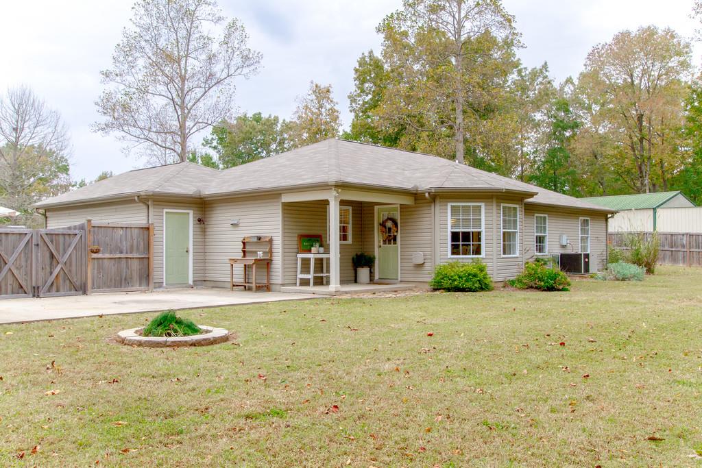 1727 Walden Ridge Road Manchester, TN 37355 - Photo 24 of 29 a front view of a house with a garden and porch