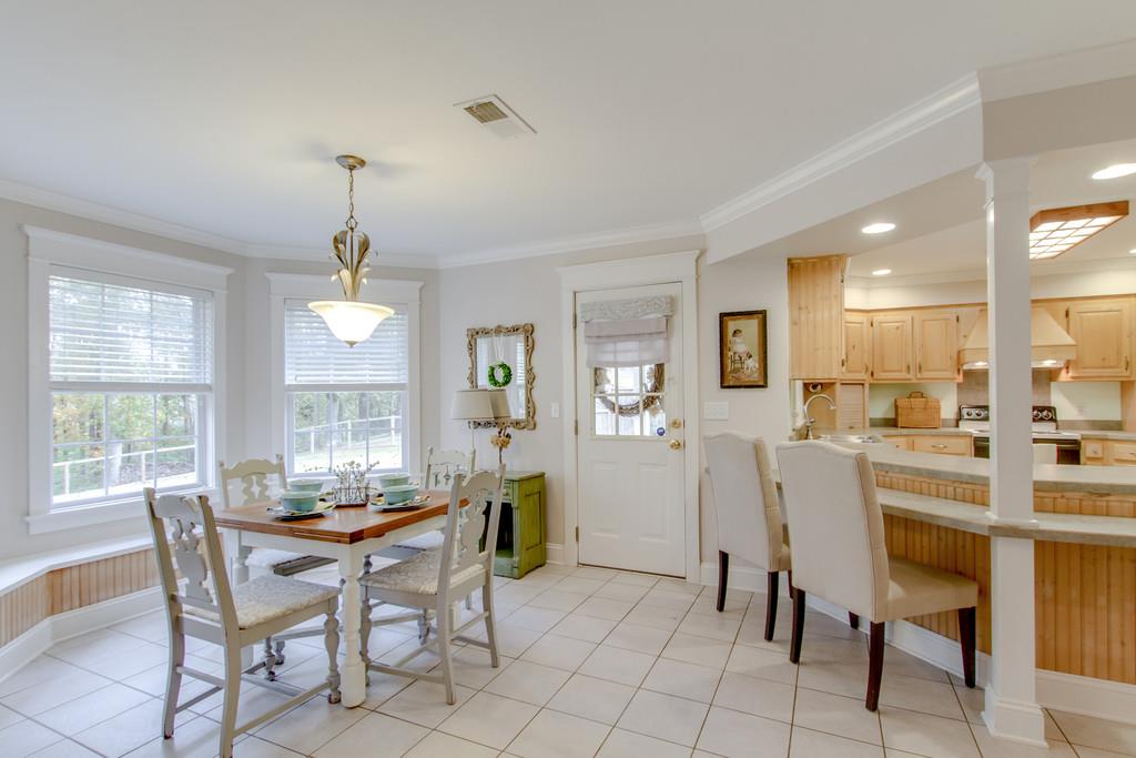 1727 Walden Ridge Road Manchester, TN 37355 - Photo 9 of 29 a view of a dining room with furniture and a chandelier