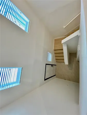 a view of wooden floor and staircase