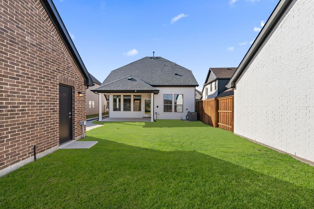 1847 Cole Road Van Alstyne, TX 75495 - Photo 15 of 26 a view of a house with backyard and porch
