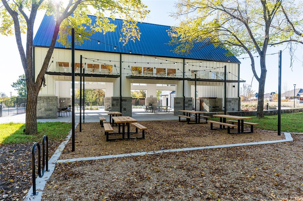 1847 Cole Road Van Alstyne, TX 75495 - Photo 20 of 26 a view of outdoor space with seating area and trees around