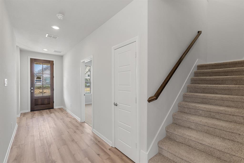 1847 Cole Road Van Alstyne, TX 75495 - Photo 4 of 26 a view of entryway with stairs and wooden floor