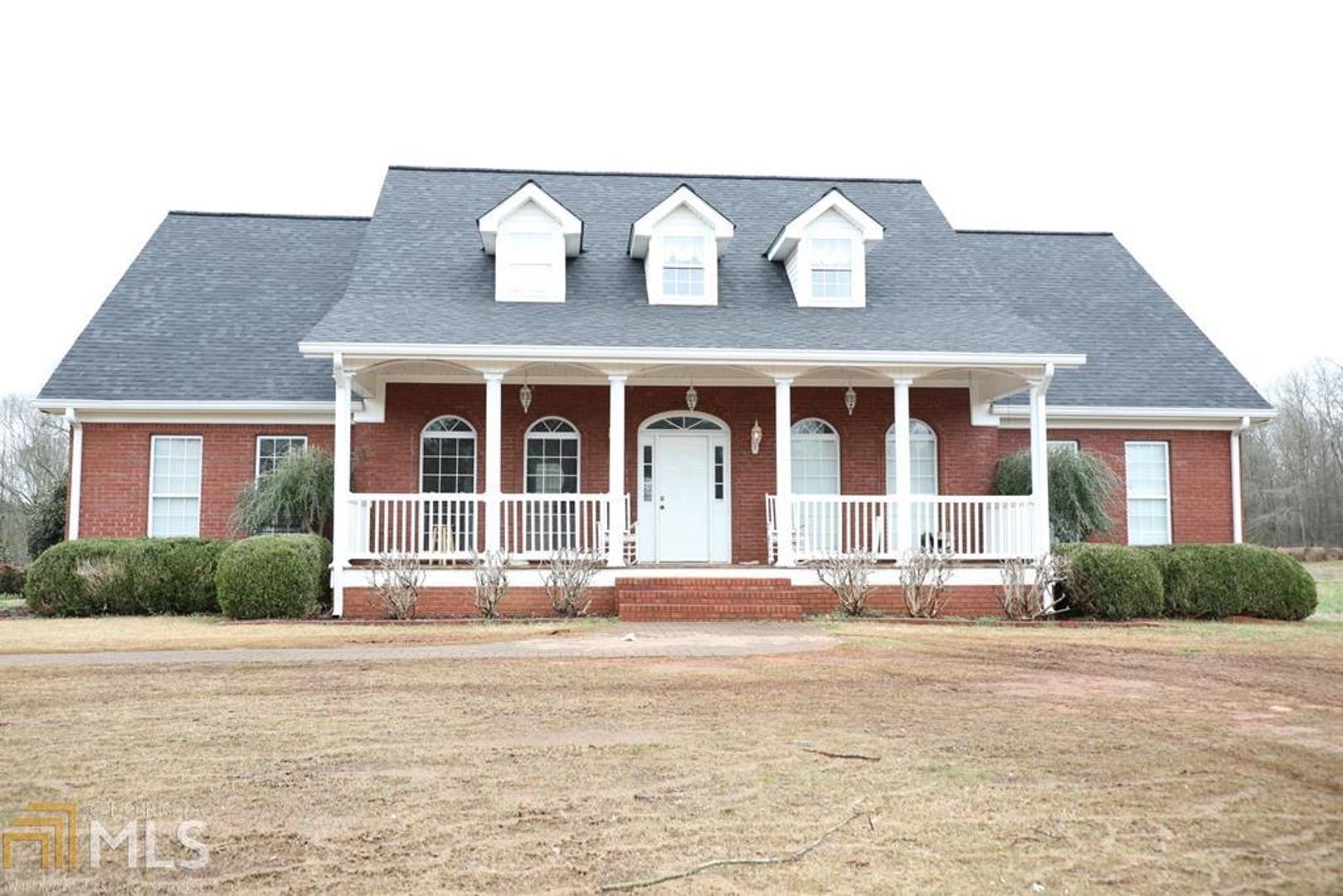 20251 Highway 46 Ranburne, AL 36273 - Photo 1 of 1 a front view of brick house with a yard