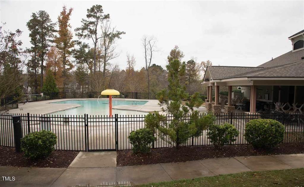 3545 Massey Ridge Court Raleigh, NC 27616 - Photo 37 of 38 a view of a house with a small yard and plants