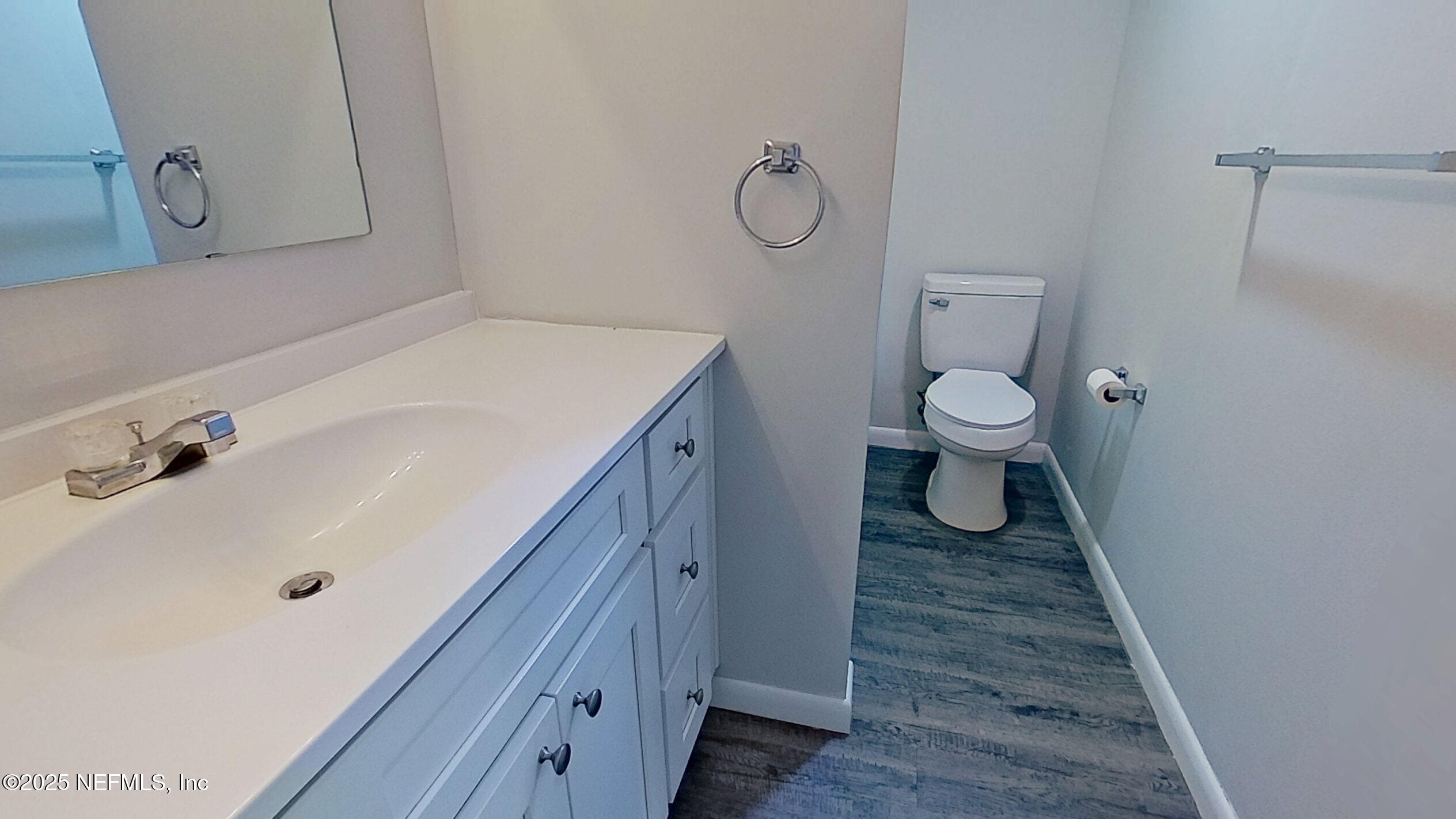 2216 Spring Park Road, Unit 8 Jacksonville, FL 32207 - Photo 24 of 32 a bathroom with a sink and a toilet