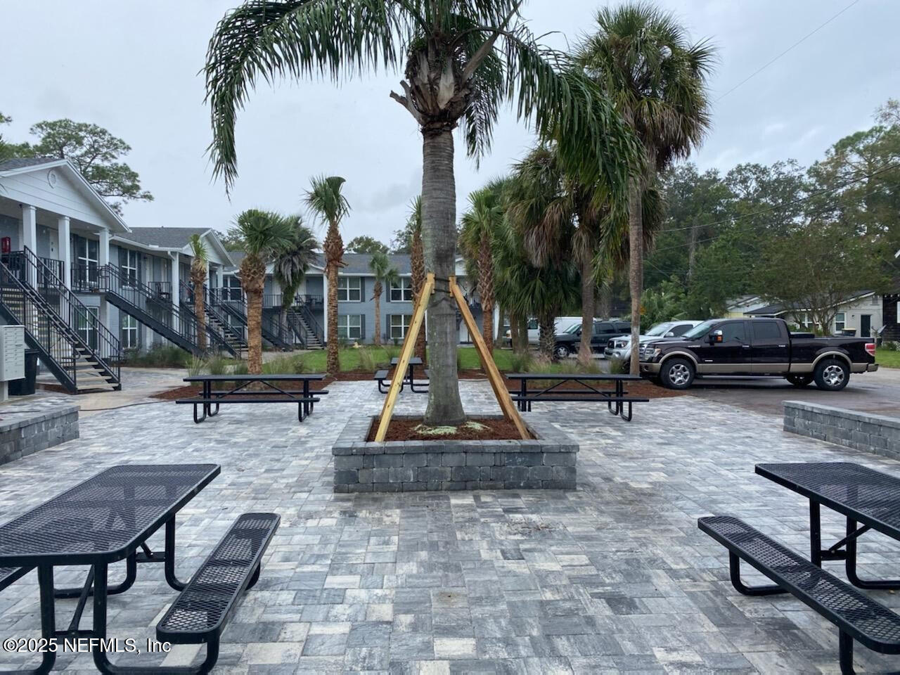 2216 Spring Park Road, Unit 8 Jacksonville, FL 32207 - Photo 4 of 32 a view of a park with swings and slide