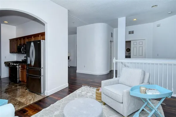 a bedroom with a bed and a table in it