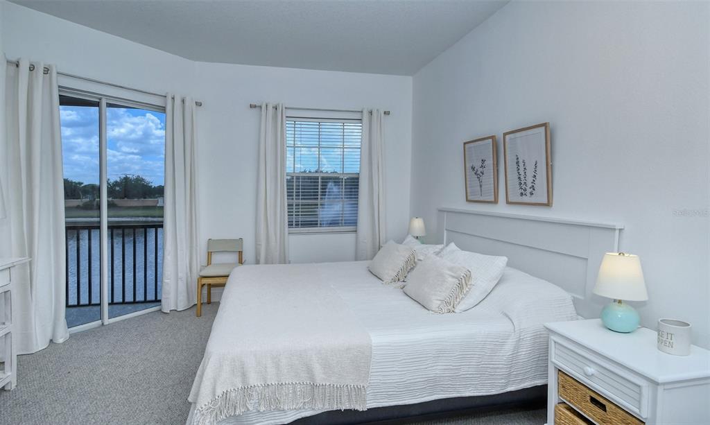 8363 Miramar Way, Unit 203 Lakewood Ranch, FL 34202 - Photo 23 of 73 a bedroom with a bed and window