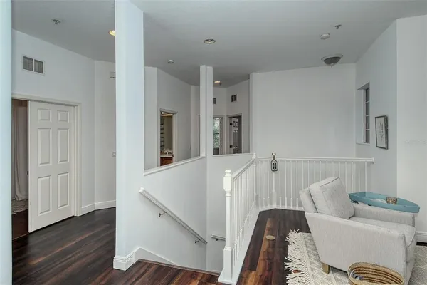 a bedroom with two beds and a window