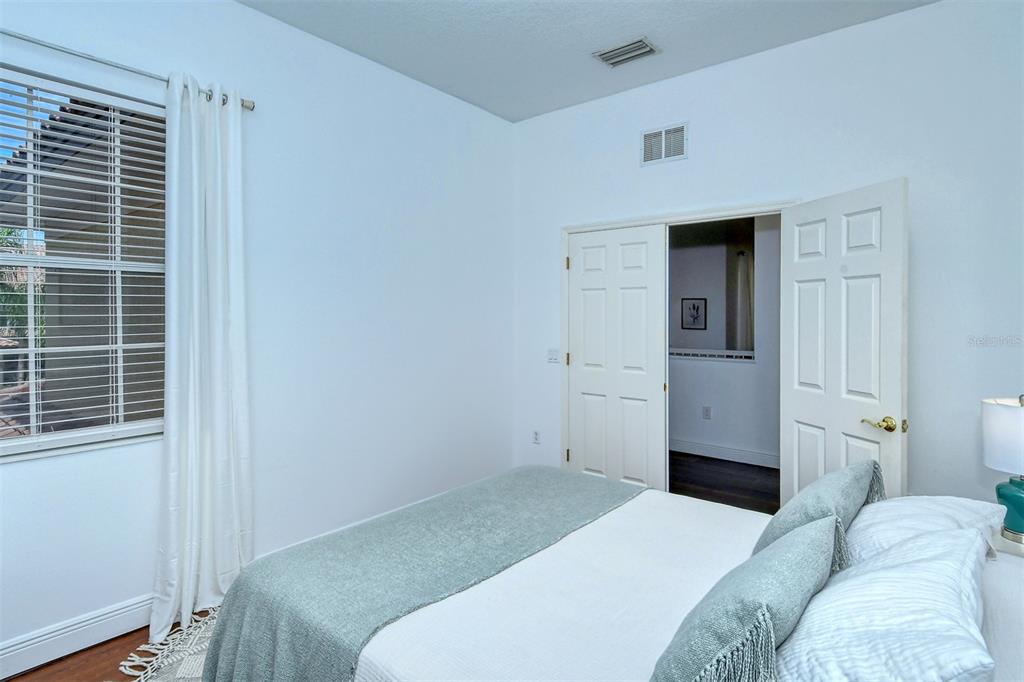 8363 Miramar Way, Unit 203 Lakewood Ranch, FL 34202 - Photo 28 of 73 a bedroom with a bed and a window