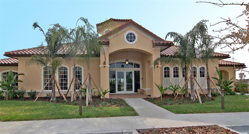 8363 Miramar Way, Unit 203 Lakewood Ranch, FL 34202 - Photo 40 of 73 a front view of a house with garden