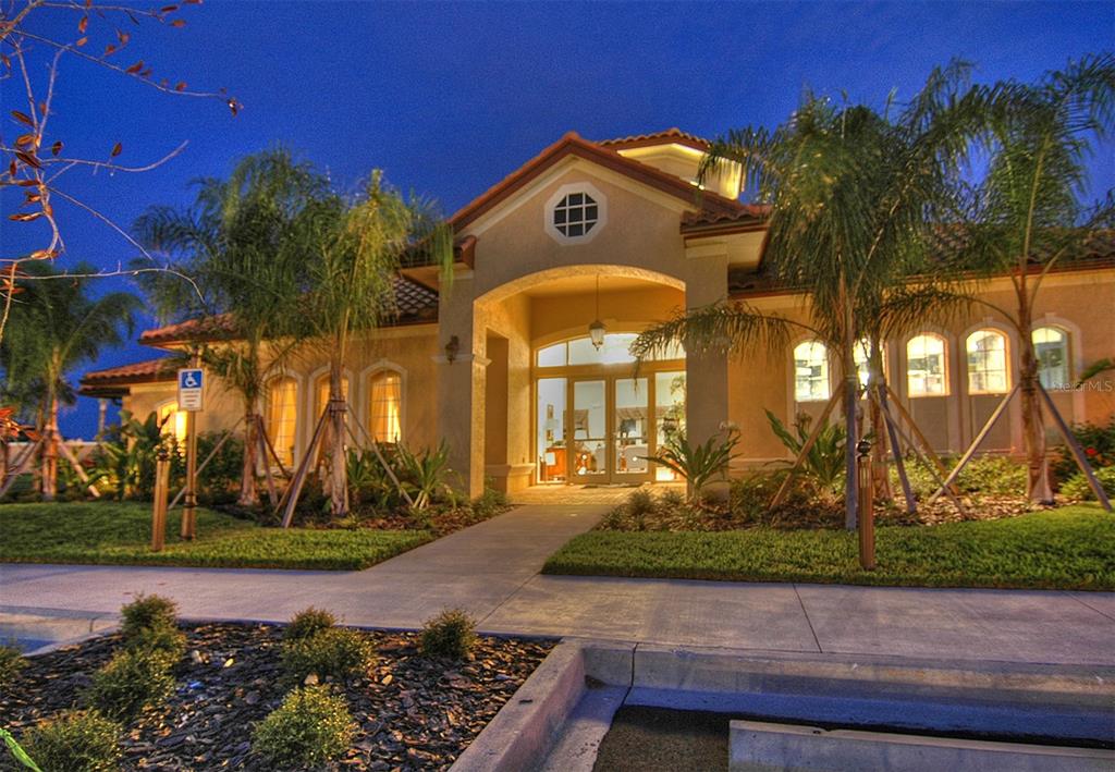 8363 Miramar Way, Unit 203 Lakewood Ranch, FL 34202 - Photo 41 of 73 front view of a house with a yard