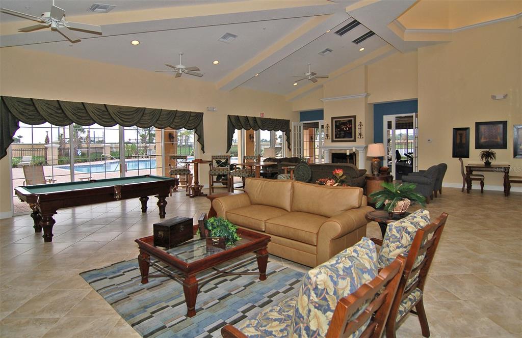 8363 Miramar Way, Unit 203 Lakewood Ranch, FL 34202 - Photo 46 of 73 a living room with furniture and a large window