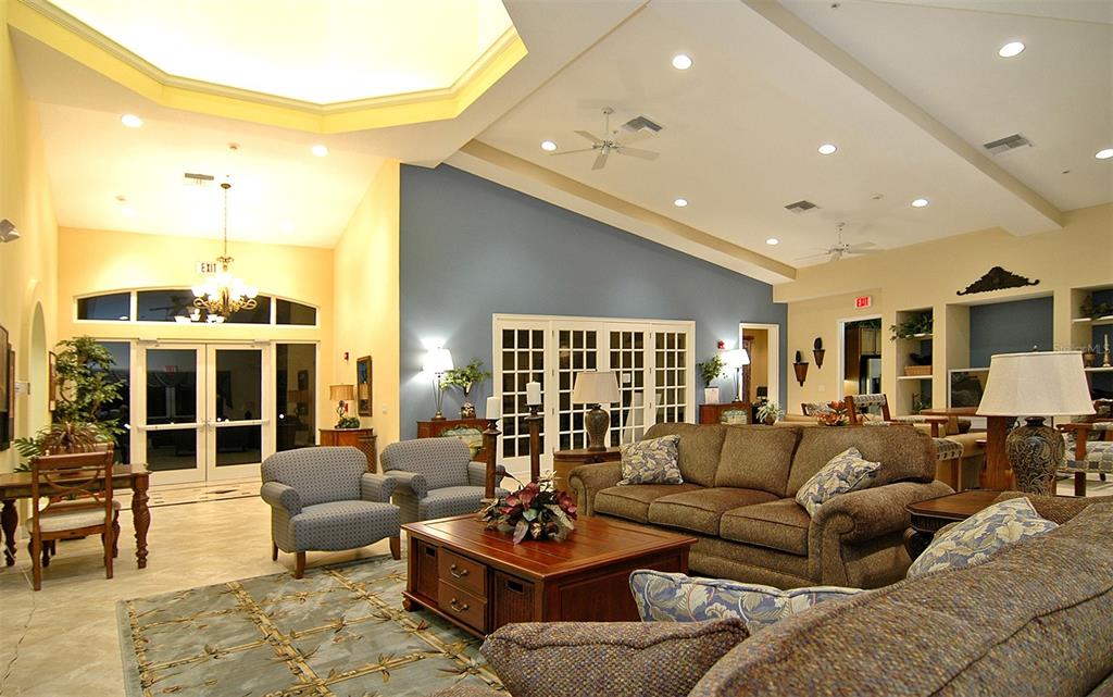 8363 Miramar Way, Unit 203 Lakewood Ranch, FL 34202 - Photo 47 of 73 a living room with furniture and a large window