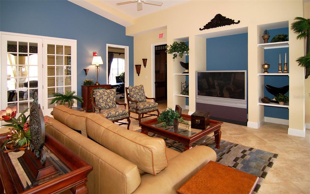 8363 Miramar Way, Unit 203 Lakewood Ranch, FL 34202 - Photo 48 of 73 a outdoor living space with furniture and a fireplace