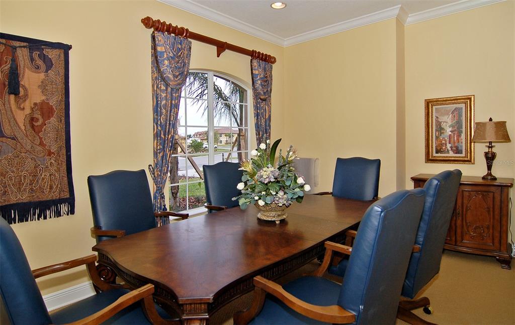 8363 Miramar Way, Unit 203 Lakewood Ranch, FL 34202 - Photo 57 of 73 a view of a dining room with furniture and wooden floor