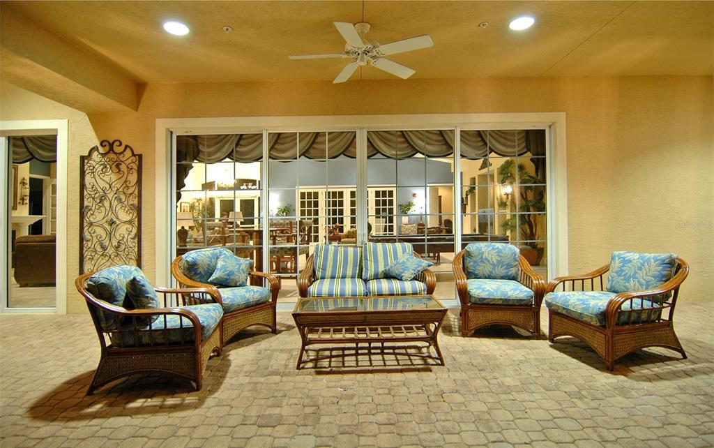 8363 Miramar Way, Unit 203 Lakewood Ranch, FL 34202 - Photo 64 of 73 a outdoor living space with furniture and a potted plant