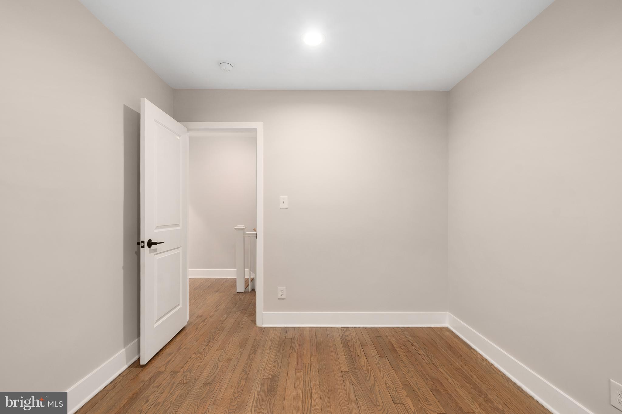 50 53rd Street Southeast Washington, DC 20019 - Photo 19 of 35 a view of a hallway with wooden floor