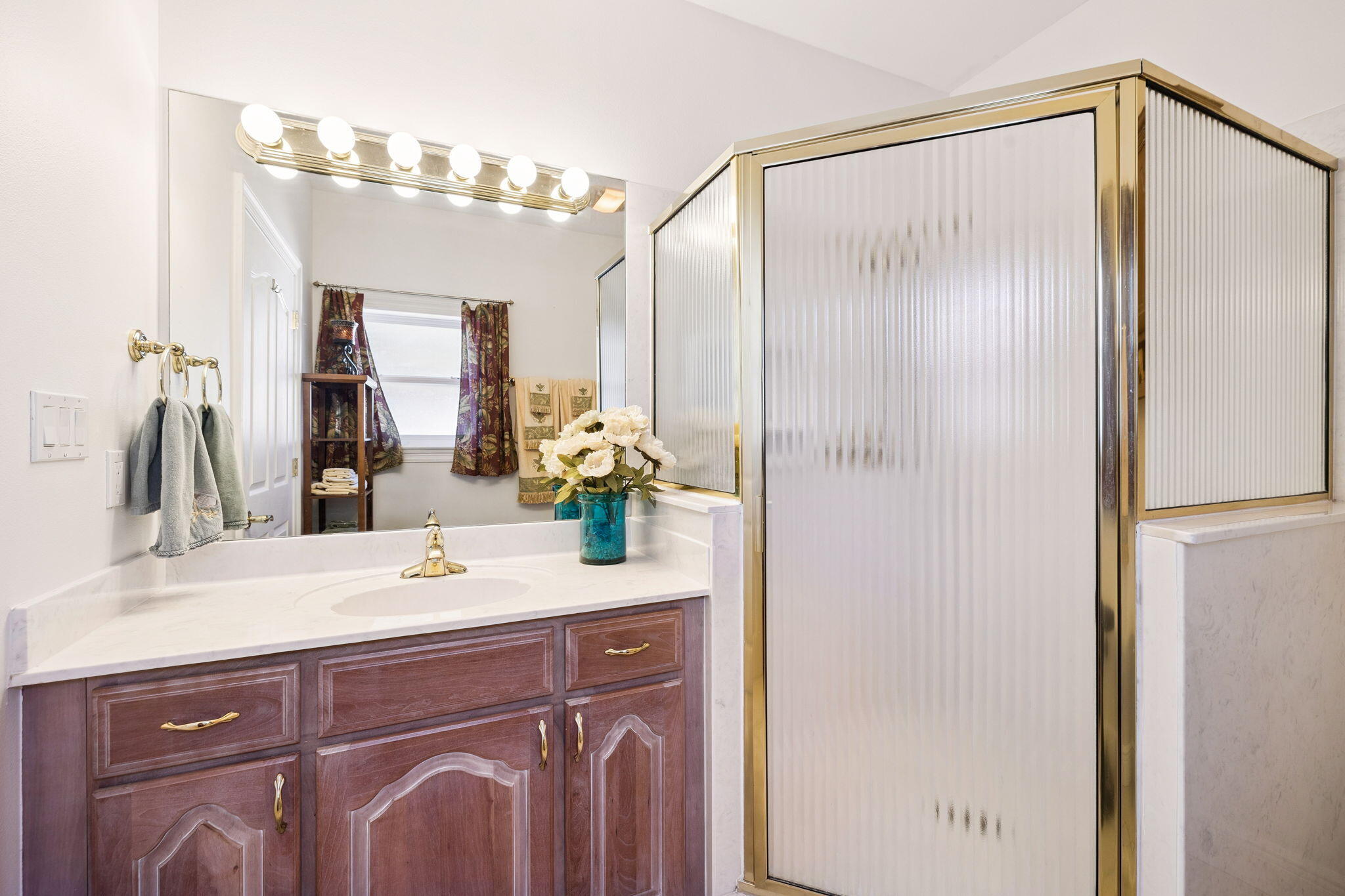 111 Snowdrift Road Miramar Beach, FL 32550 - Photo 13 of 32 a bathroom with a sink vanity and a mirror