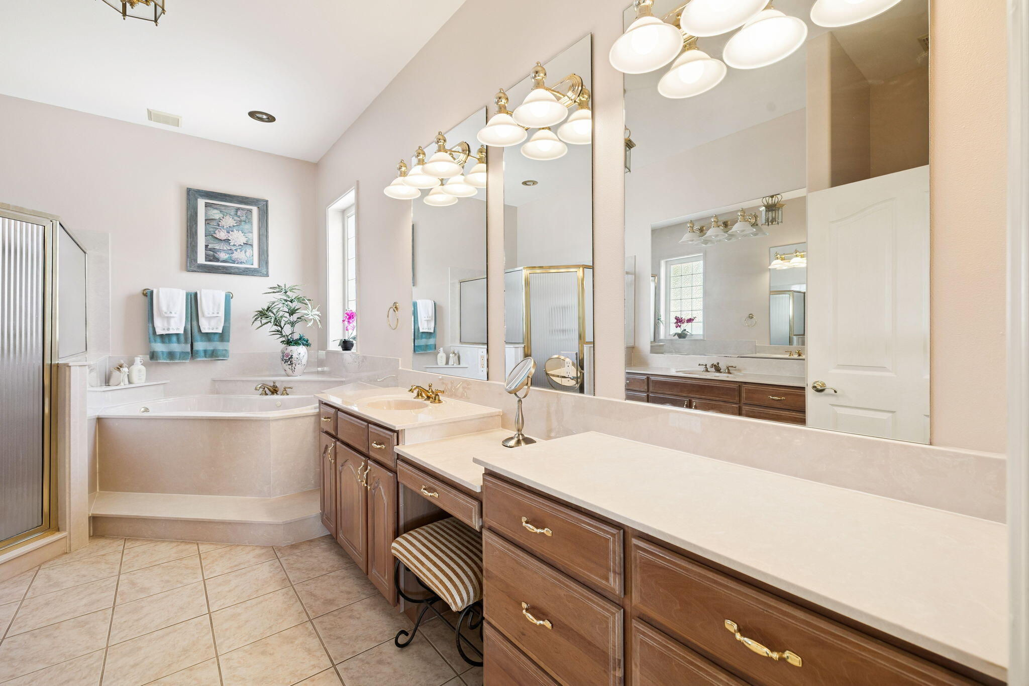 111 Snowdrift Road Miramar Beach, FL 32550 - Photo 22 of 32 a large white kitchen with a sink and large mirror with bathtub