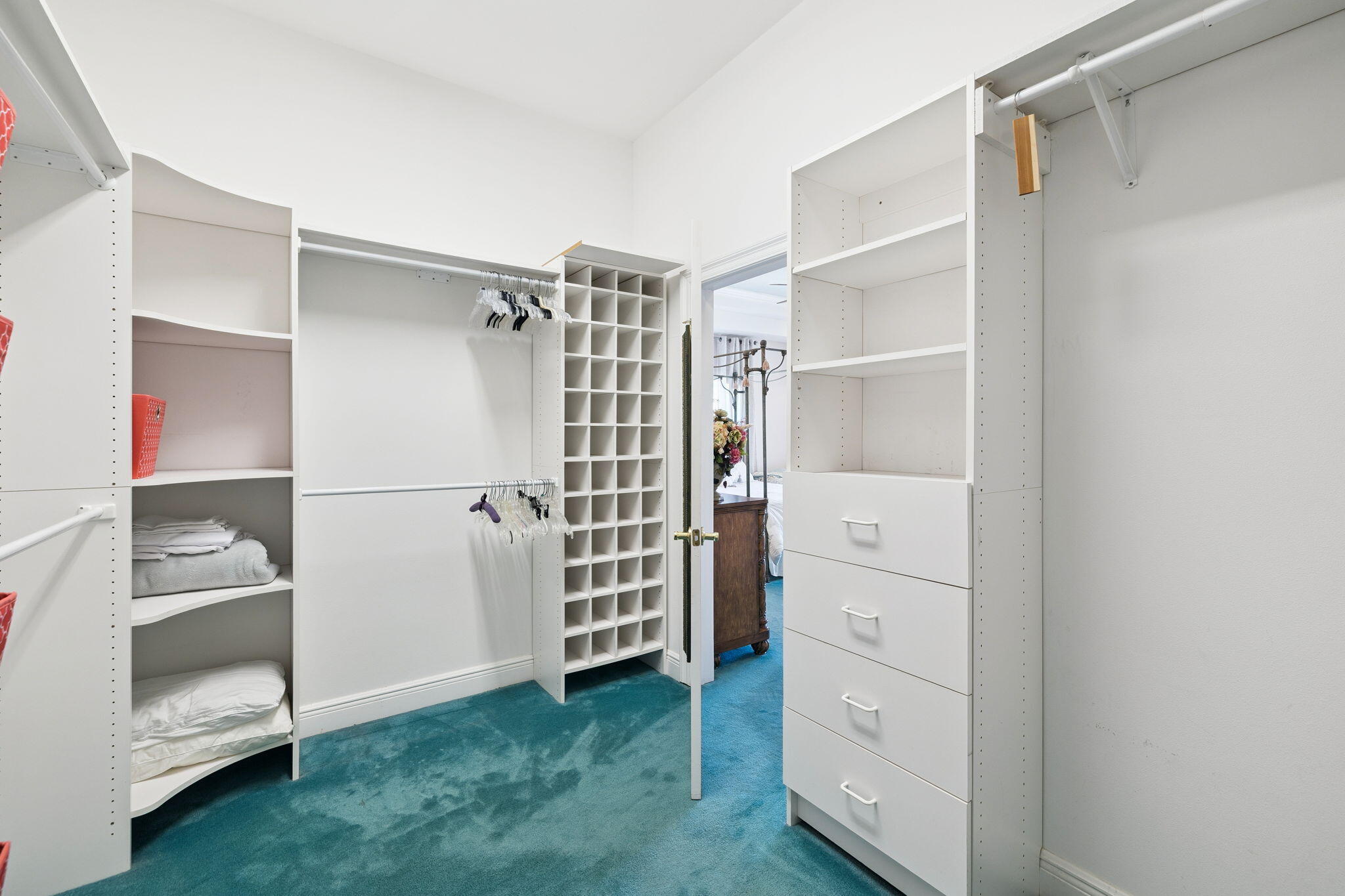 111 Snowdrift Road Miramar Beach, FL 32550 - Photo 25 of 32 a view of walk in closet with clothes and shoes