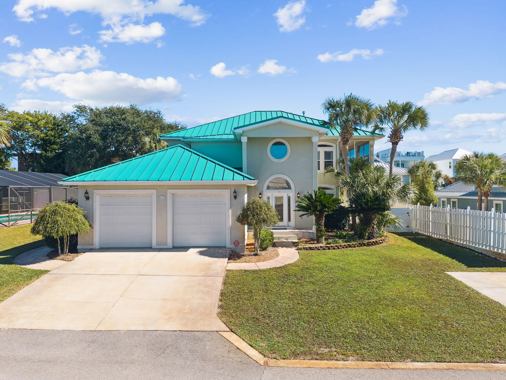111 Snowdrift Road Miramar Beach, FL 32550 - Photo 3 of 32 a front view of a house with a yard