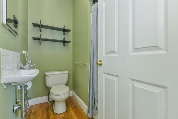 330 E Street, Unit 1 Boston, MA 02127 - Photo 19 of 24 a bathroom with a toilet and a sink