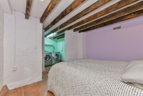 330 E Street, Unit 1 Boston, MA 02127 - Photo 22 of 24 a bedroom with a bed and a window