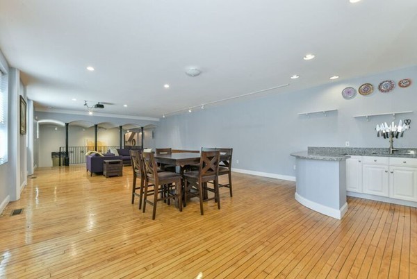 330 E Street, Unit 1 Boston, MA 02127 - Photo 5 of 24 a view of a kitchen and dining room