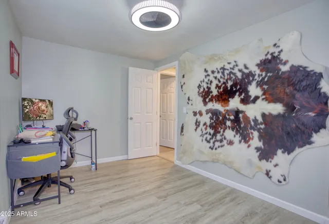 a house with a tree in front of it