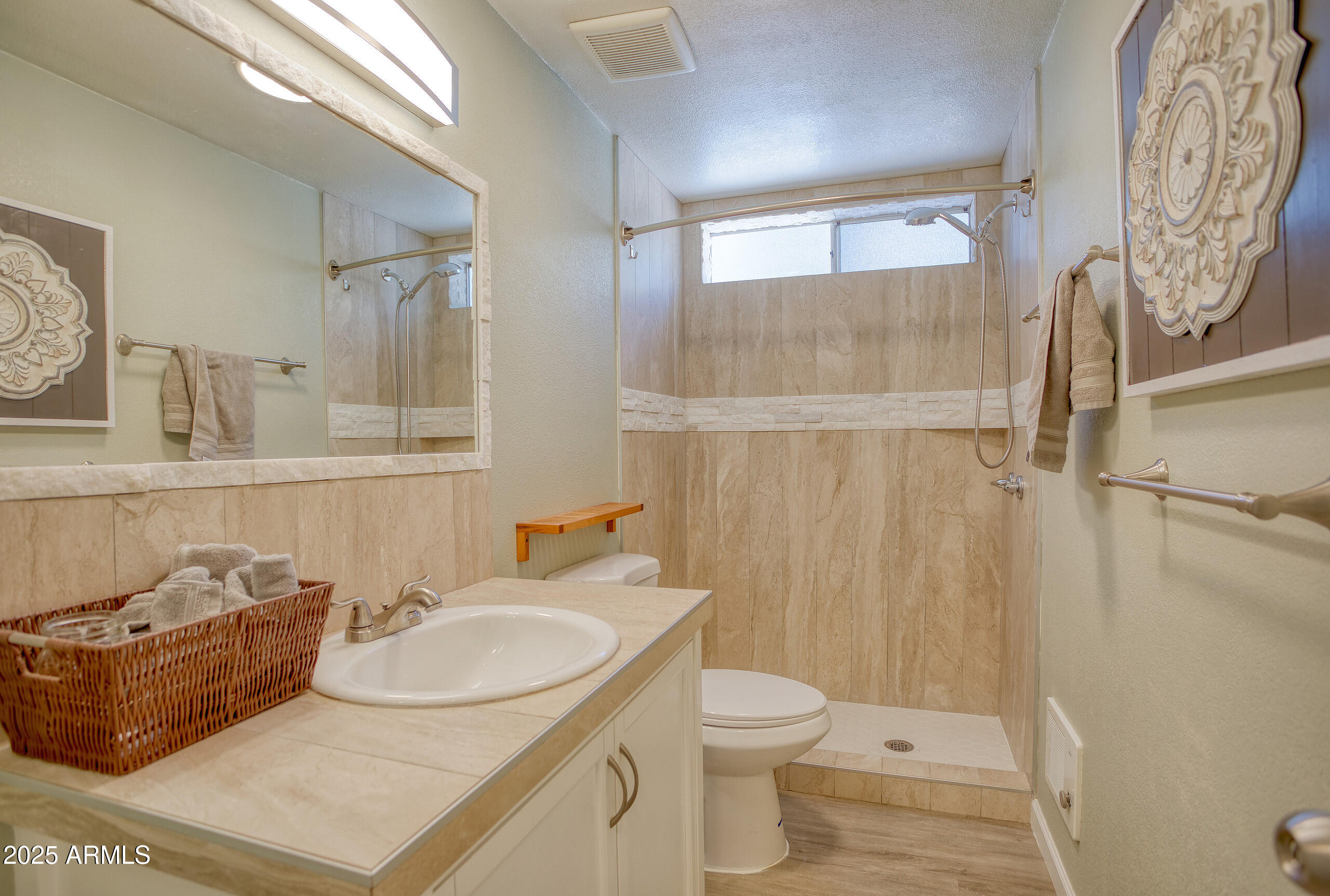 17090 Iron Springs Road Munds Park, AZ 86017 - Photo 43 of 68 a bathroom with a sink and a mirror