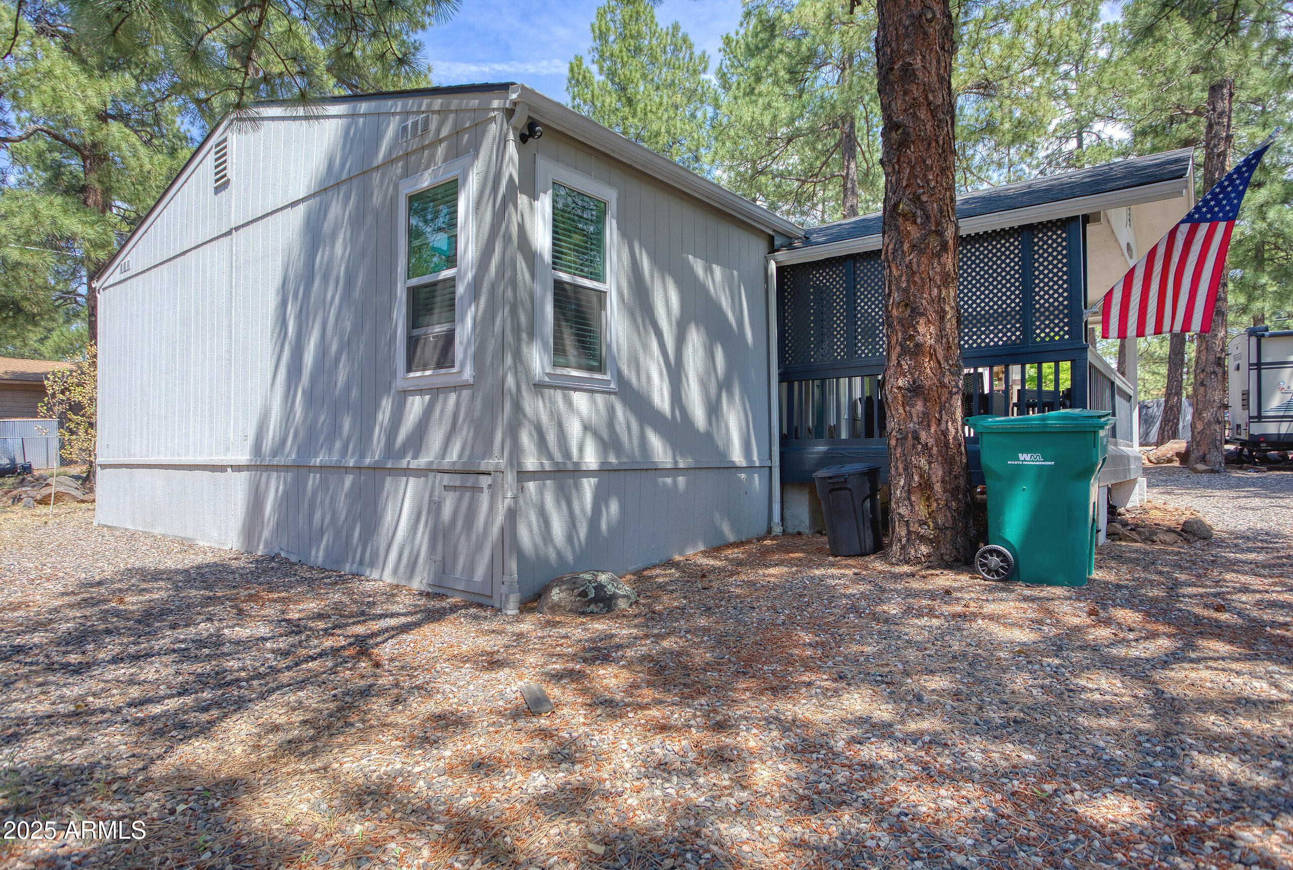 17090 Iron Springs Road Munds Park, AZ 86017 - Photo 61 of 68 a view of a house with backyard and tree