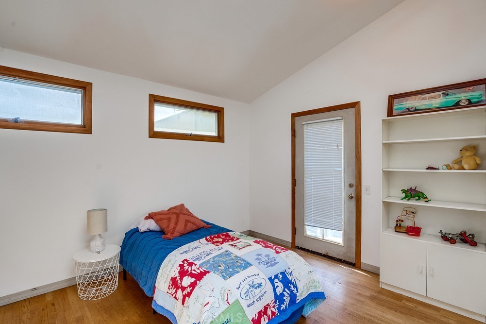 711 Marco Place Venice, CA 90291 - Photo 13 of 14 a bedroom with bed and a window