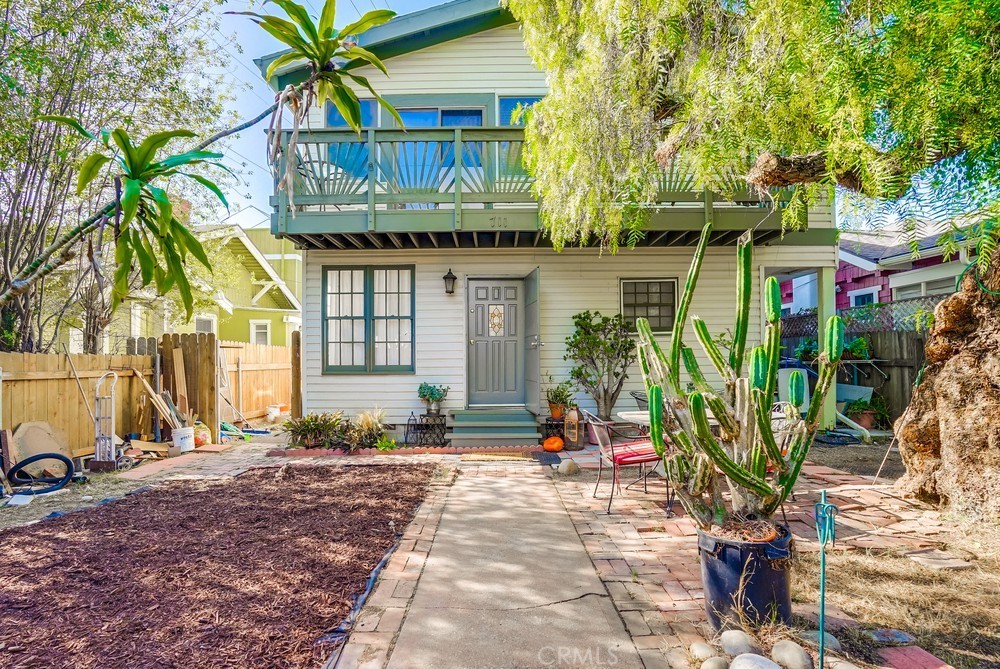 711 Marco Place Venice, CA 90291 - Photo 2 of 14 a front view of a house with a yard