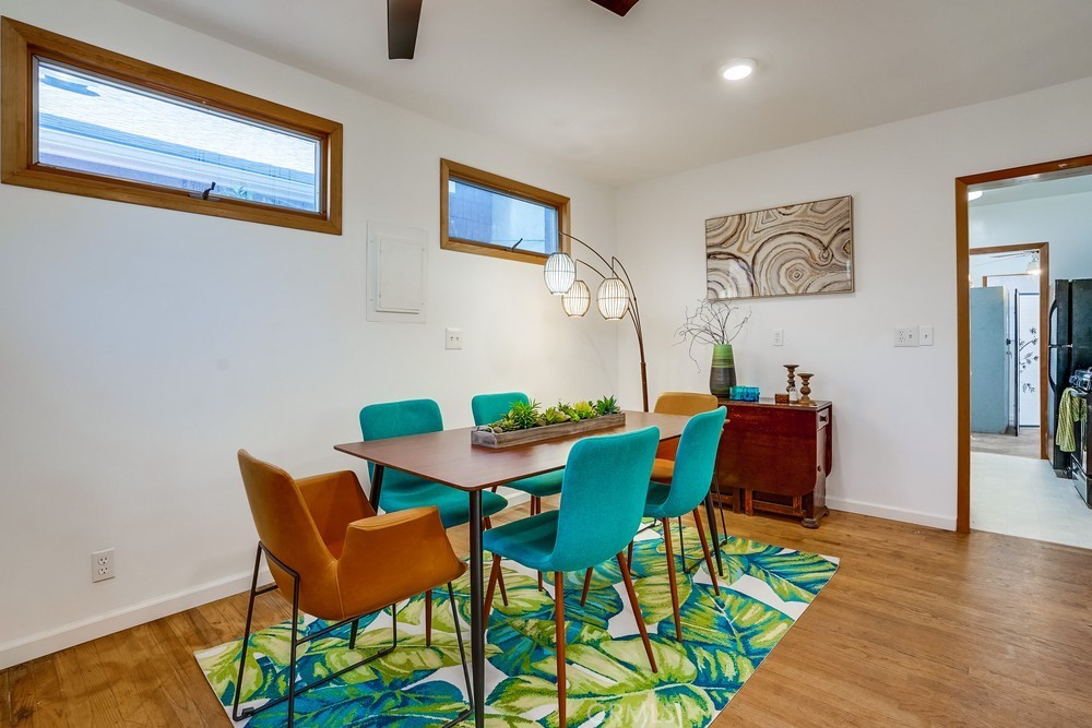 711 Marco Place Venice, CA 90291 - Photo 4 of 14 a view of a dining room with furniture and wooden floor