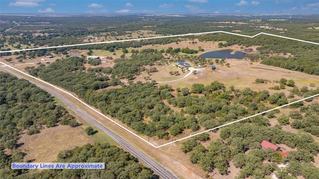 7441 Farm To Market 1956 Road Nocona, TX 76255 - Photo 2 of 40 a view of a balcony with an outdoor space