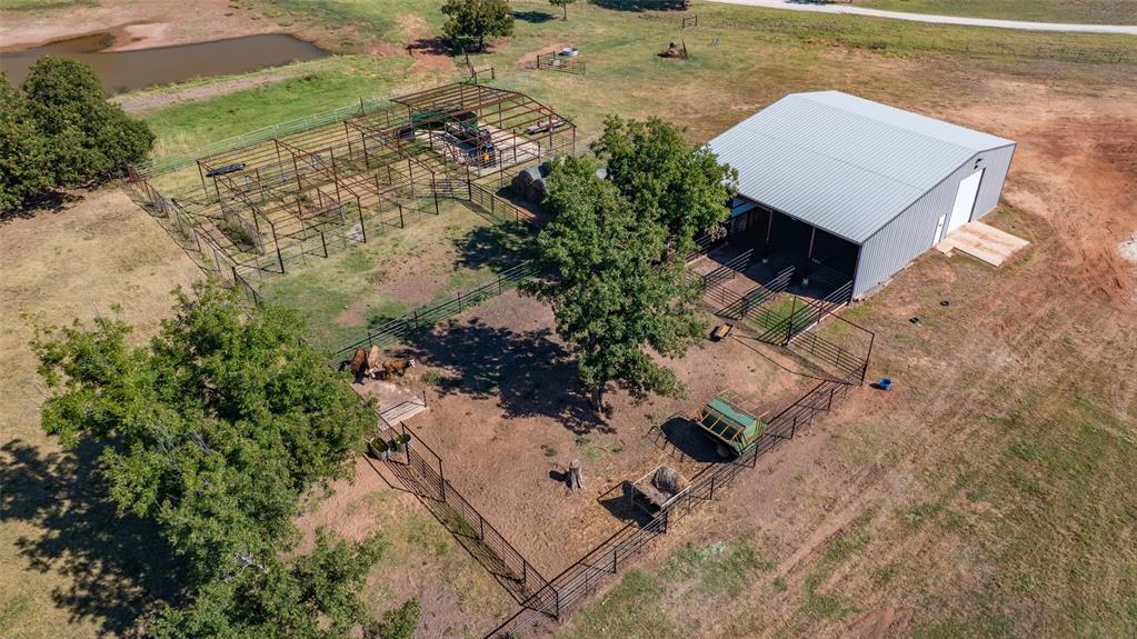 7441 Farm To Market 1956 Road Nocona, TX 76255 - Photo 31 of 40 an aerial view of a house with a yard