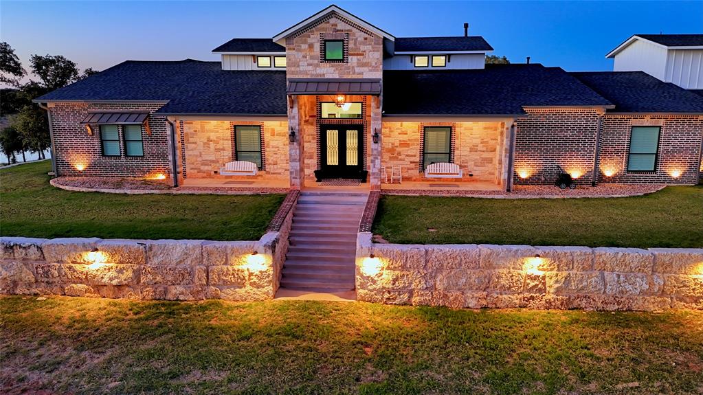 7441 Farm To Market 1956 Road Nocona, TX 76255 - Photo 7 of 40 a front view of a house with a yard