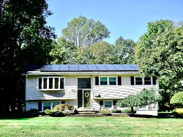 a house view with a garden space