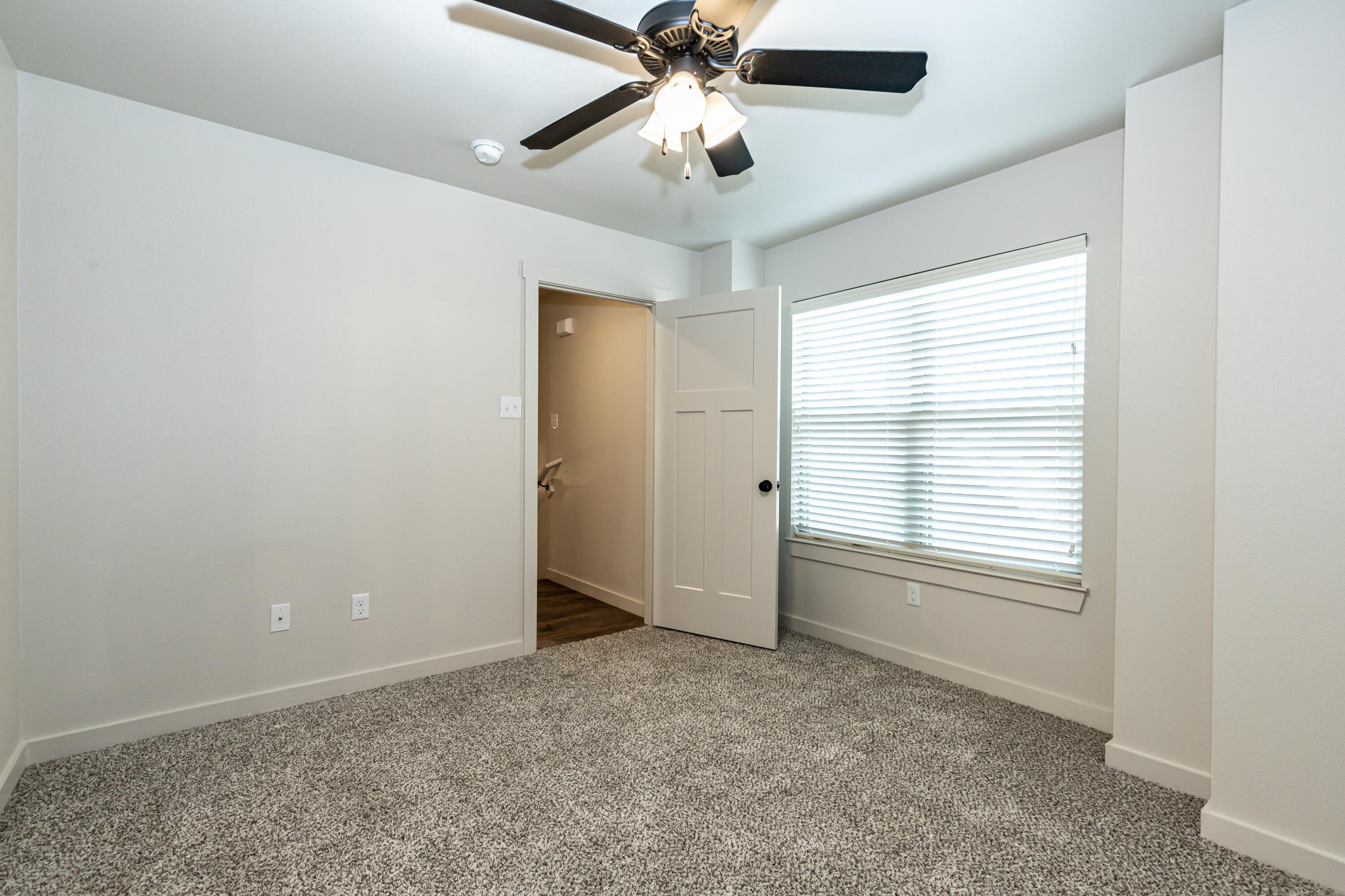 2529 138th Street Lubbock, TX 79423 - Photo 16 of 24 a view of an empty room with a window