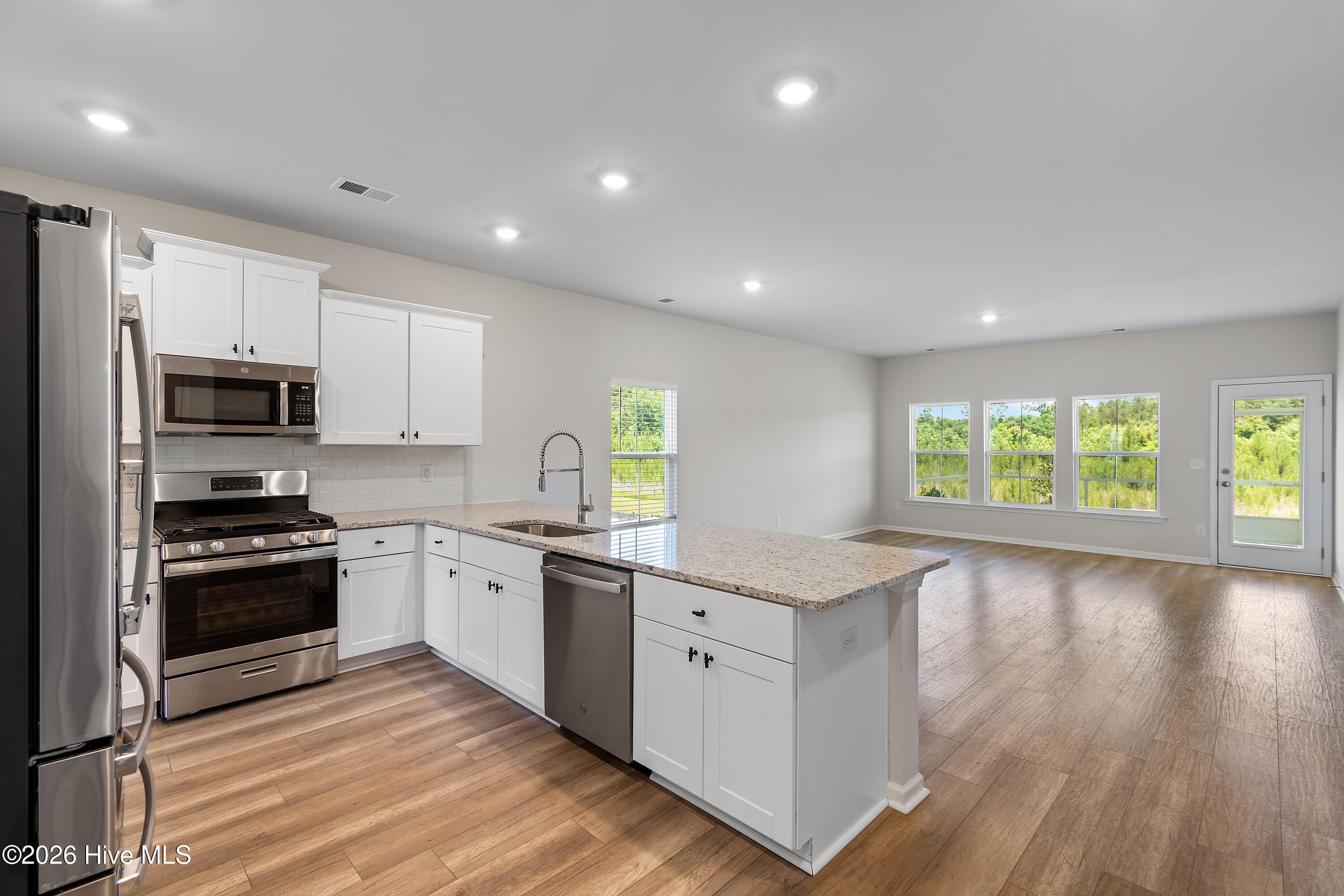 8850 Baton Rouge Avenue Northwest Calabash, NC 28467 - Photo 7 of 58 Kitchen-Open Living Space