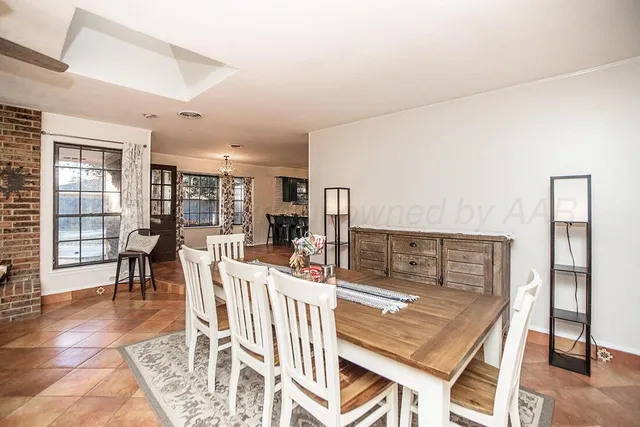 a spacious bathroom with a double vanity sink mirror and toilet
