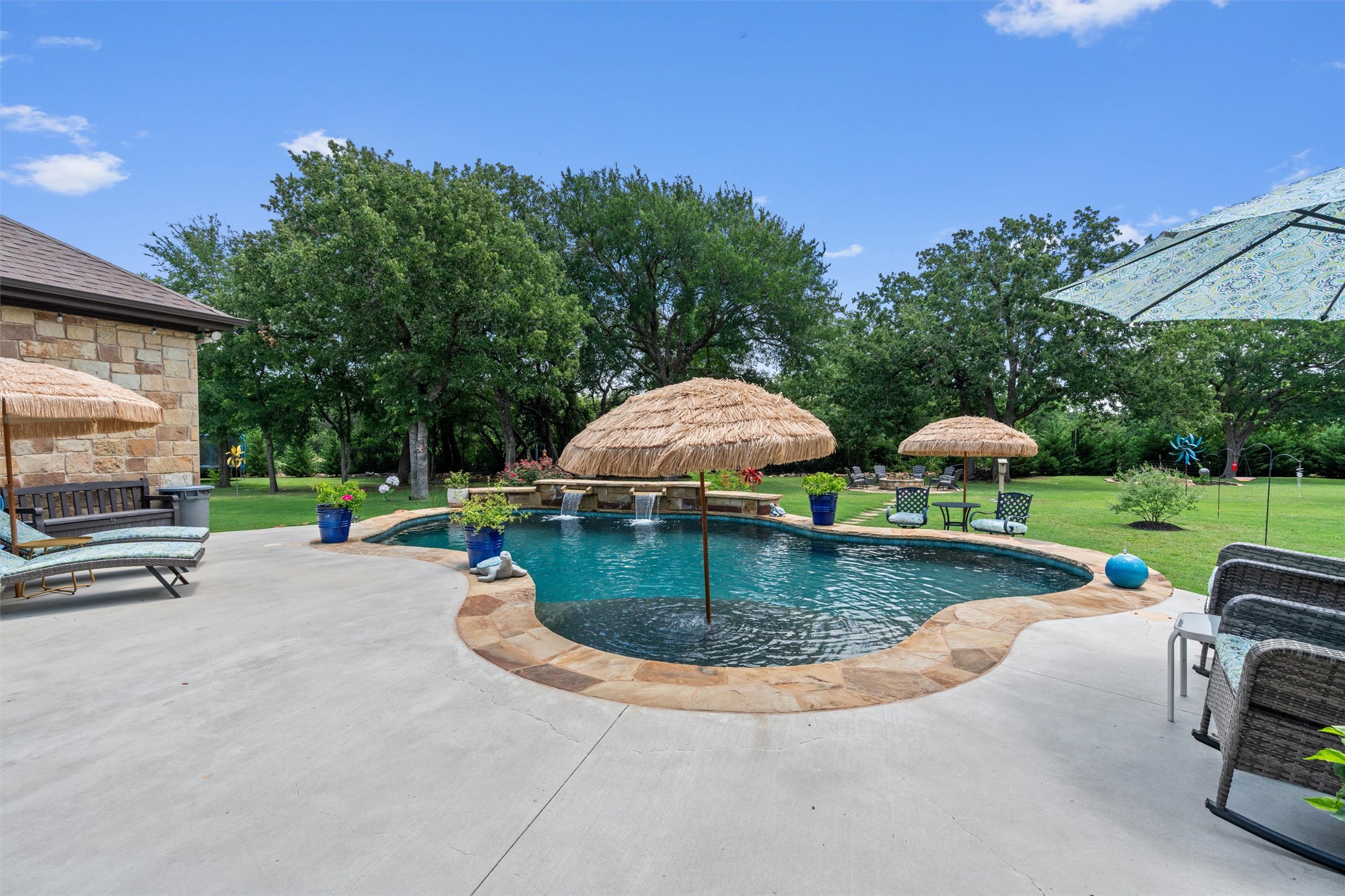 104 Adobe Cove Georgetown, TX 78633 - Photo 31 of 40 An inviting private pool and patio area await, perfect for recreation and relaxation.