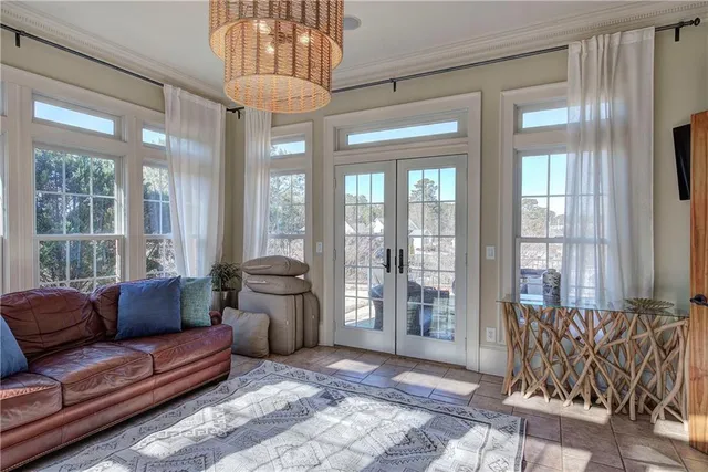 a view of a chairs and table in the patio