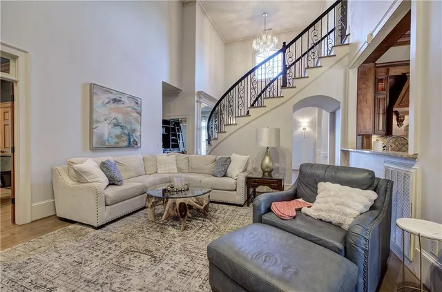 a bedroom with a bed and ceiling fan