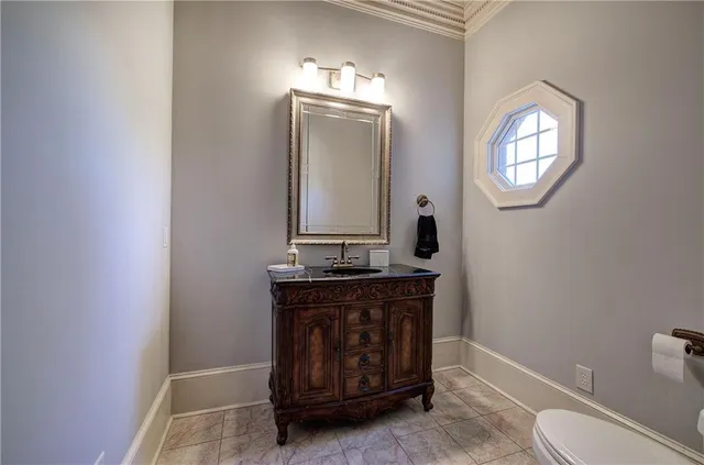 a living room with furniture a rug and a window