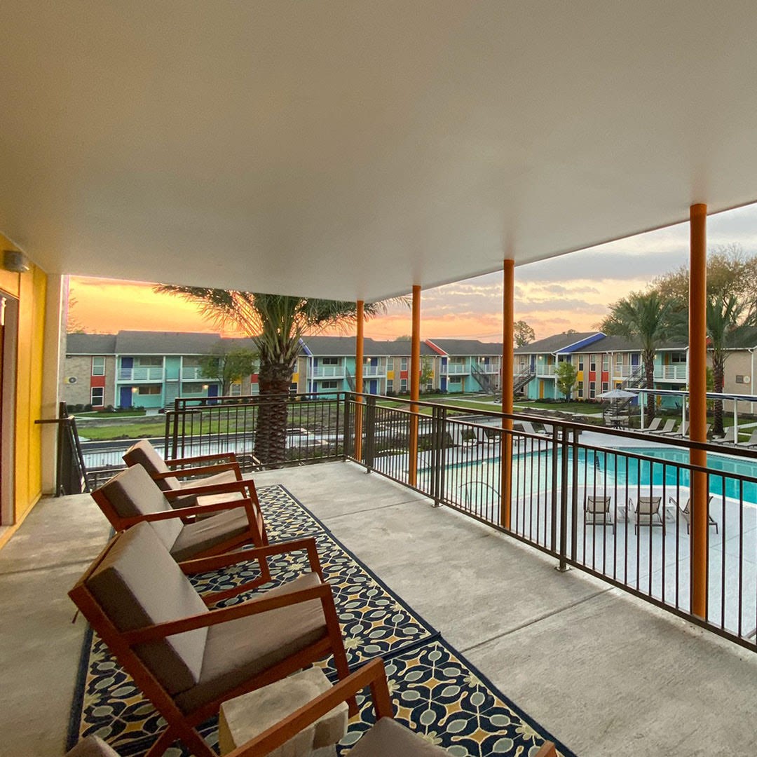 8787 Hammerly Boulevard, Unit 222 Houston, TX 77080 - Photo 7 of 39 a living room with furniture and a floor to ceiling window